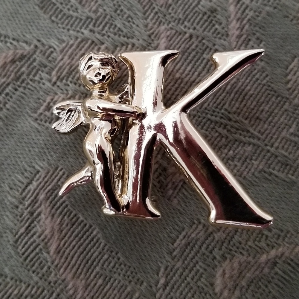Gold Colored Pin w/"K"